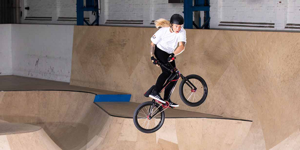 Charlotte Worthington in the air on her BMX.